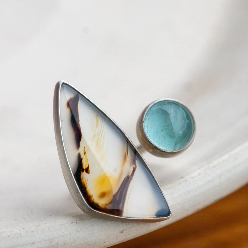 
                  
                    ACROSS THE UNIVERSE MONTANA AGATE + AQUAMARINE RING - Fly Free
                  
                