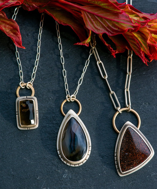 ANCIENT EARTH NECKLACES - Fly Free