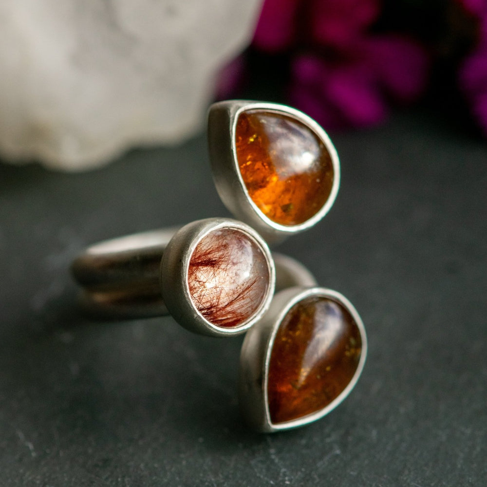 
                  
                    WINGED LIGHT GARNET RING - Fly Free
                  
                