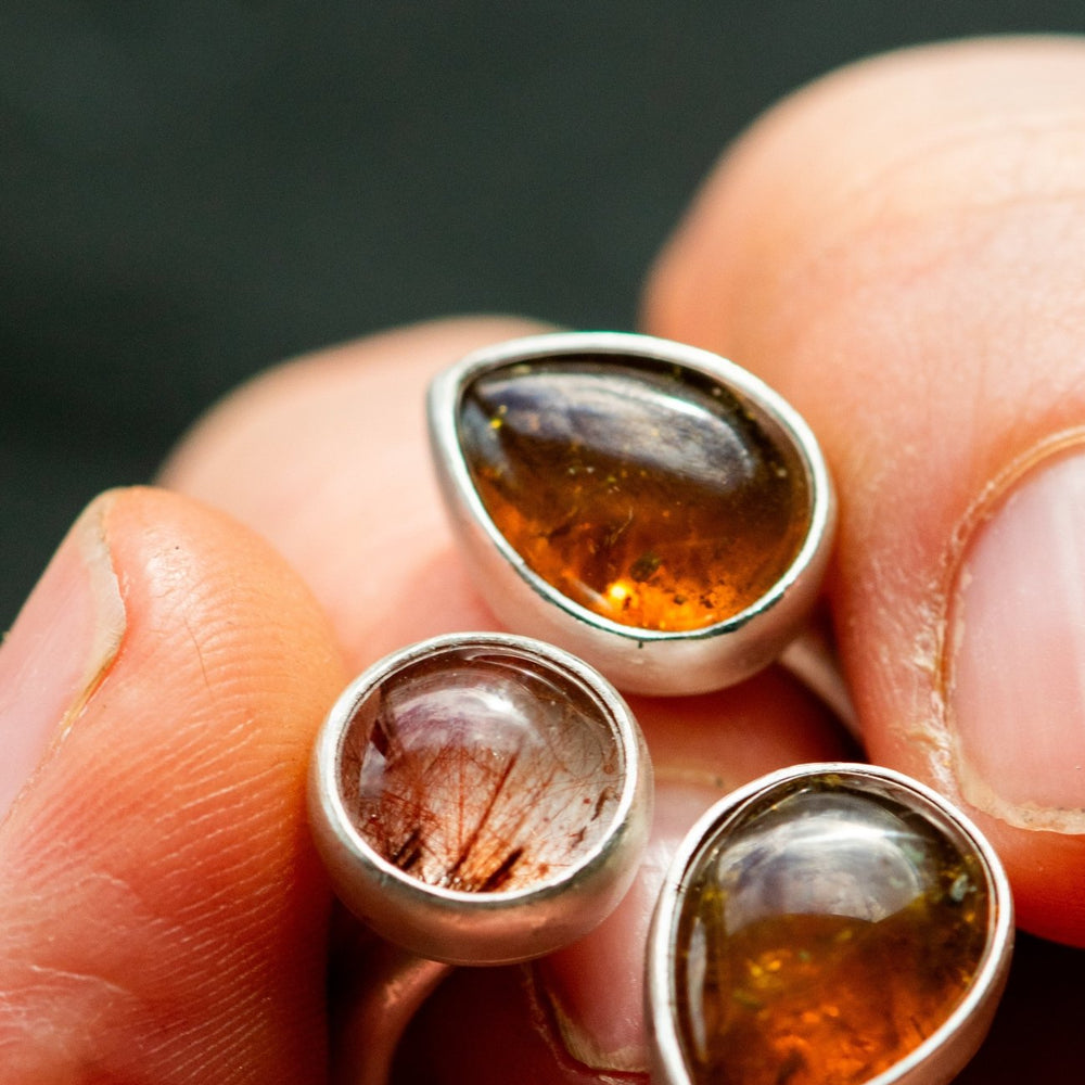 
                  
                    WINGED LIGHT GARNET RING - Fly Free
                  
                