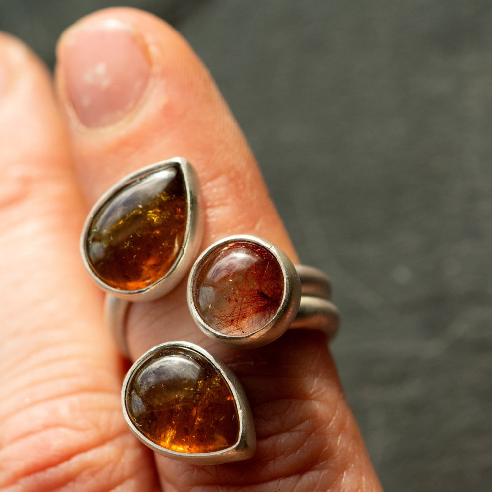 
                  
                    WINGED LIGHT GARNET RING - Fly Free
                  
                