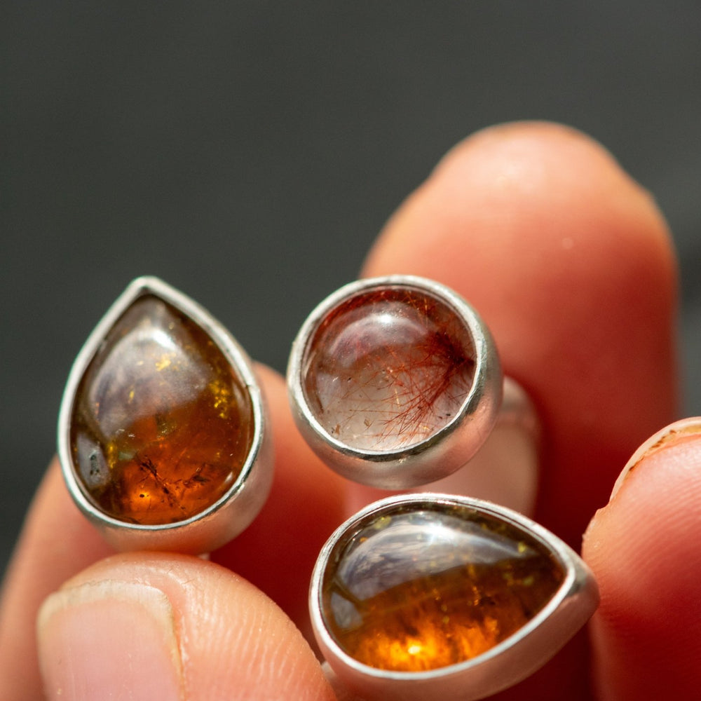 
                  
                    WINGED LIGHT GARNET RING - Fly Free
                  
                
