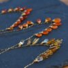 EARRING DISTRIBUTION SYSTEM - Fly Free