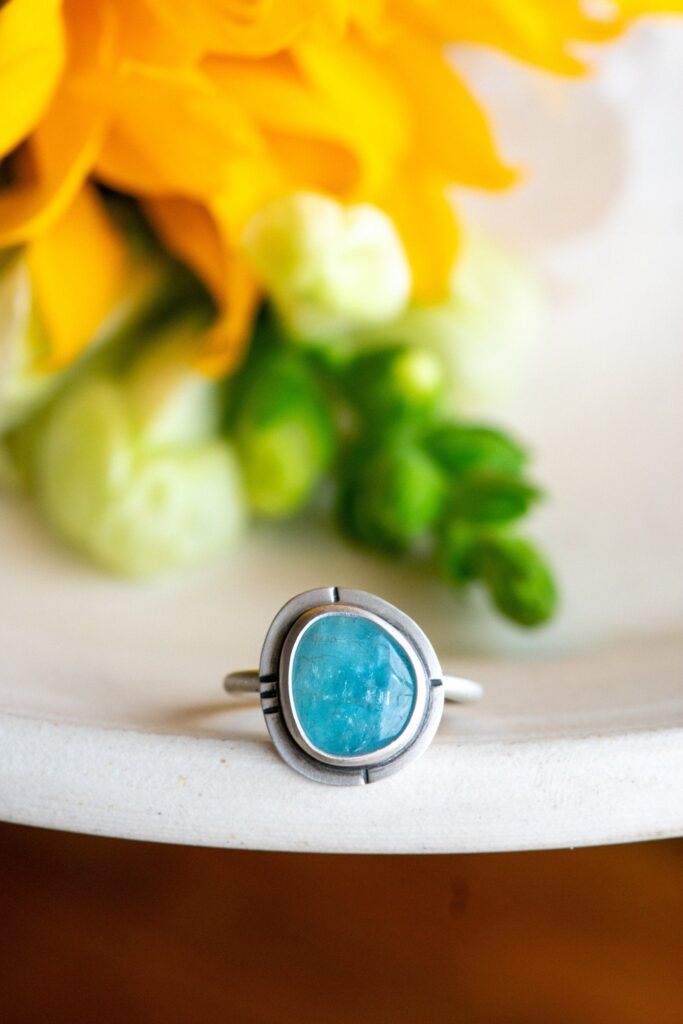 EGGED ON AQUAMARINE RING - Fly Free